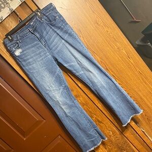 Blue Distressed Jeans with Frayed Hem